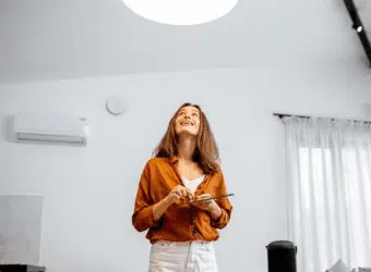 Modern living room with automated lighting and ambient smart controls