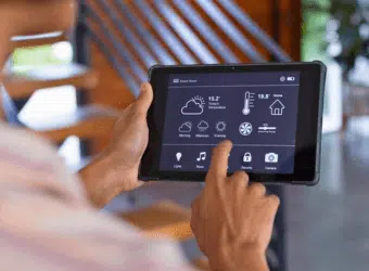 Customized smart home dashboard interface on a wall-mounted panel