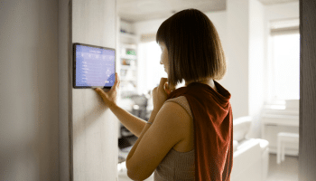 Tablet Displaying Integrated Smart Home Control Dashboard